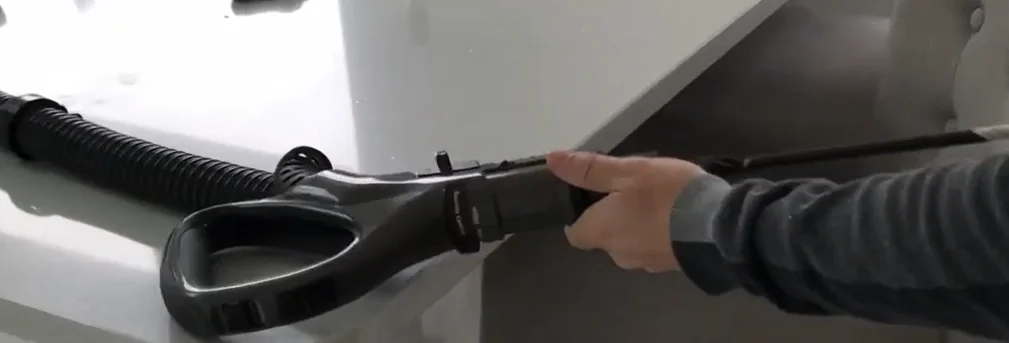Unclogging Dyson vacuum hose with a long object